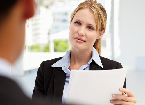 A photo of a staff holding a paper